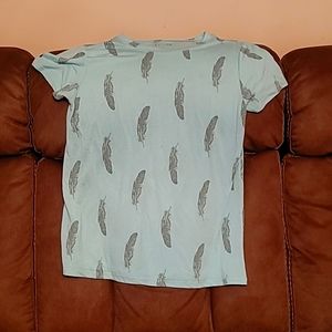 Light green T-shirt with Gray feathers on it size L